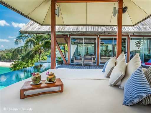 Laemsingh 3 is one of 5 luxury waterfront villas set on a small headland a short stroll from Laem Singh beach and Surin beach. The villa has a gym, children's playroom a 25m lap pool and kiddies pool/jacuzzi.